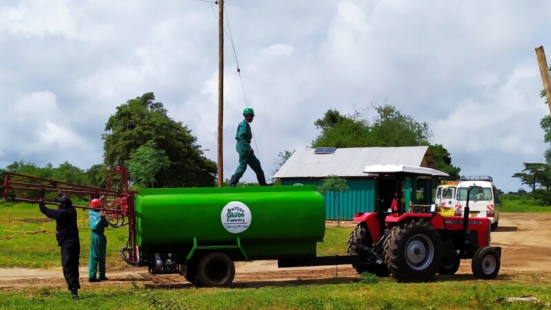 Sustainability farmers working with a tractor and trailer